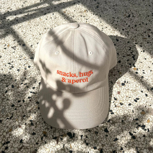 snacks, hugs & aperol Cap