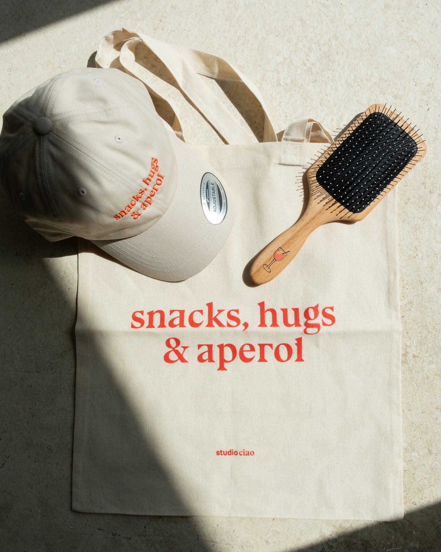 snacks, hugs & aperol Cap